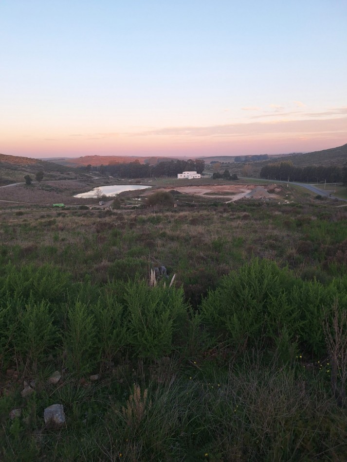 Lote en Country Altos Aires ( Valle escondido )